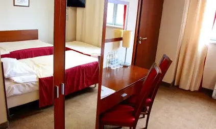 Habitación con cama supletoria